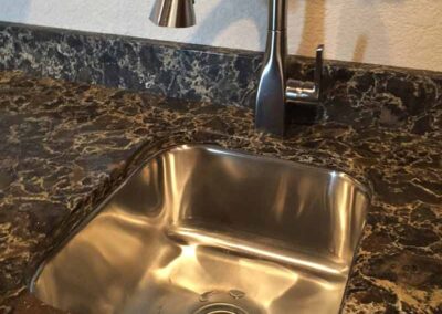 Kitchen sink with stainless steel